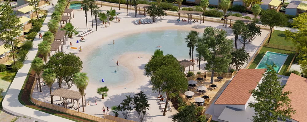 een tropisch lagunebad met zandstrand op Domaine La Yole in 2024