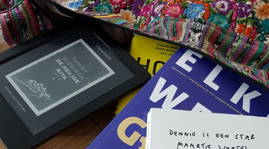 Géén gesleep met zware boeken, pak je E-reader in